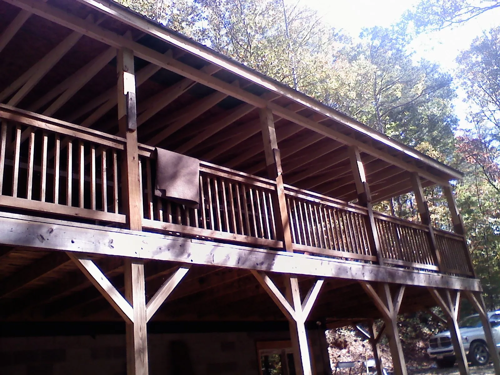 Timber framing under a new elevated porch and deck — Roof Leak Repair in Rebecca by Roofing Brothers